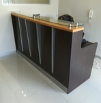 Reception counter with raised glass top